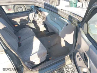 1993 Ford Taurus GL with VIN 1FALP5240PG327124, listed as a IAAI auction lot 42074204 with 27,681 mi miles. Bid and sale history available at carsss.com. Image 5.