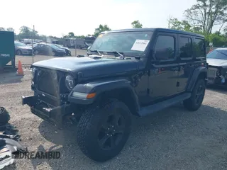 2020 Jeep Wrangler Unlimited Sahara High Altitude with VIN 1C4HJXEGXLW182581, listed as a IAAI auction lot 42612084 with 52,656 mi miles and . Bid and sale history available at DreamBid. Image 19.