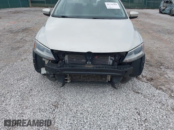 2012 Volkswagen Jetta TDI w/Premium with VIN 3VWLL7AJ2CM317216, listed as a IAAI auction lot 41731204 with 320,474 mi miles and . Bid and sale history available at DreamBid. Image 6.
