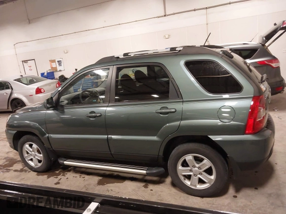 2009 Kia Sportage LX with VIN KNDJE723097558182, listed as a IAAI auction lot 41295142 with 147,200 mi miles. Bid and sale history available at carsss.com. Image 15.
