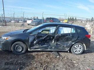 2017 Subaru Impreza with VIN 4S3GTAA60H3746716, listed as a IAAI auction lot 41846153 with 76,704 mi miles. Bid and sale history available at carsss.com. Image 14.