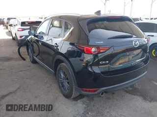 2020 Mazda CX-5 Touring with VIN JM3KFACM0L0804998, listed as a IAAI auction lot 41850998 with 44,519 mi miles. Bid and sale history available at carsss.com. Image 3.
