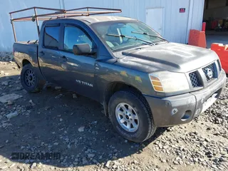 2005 Nissan Titan SE with VIN 1N6AA07BX5N502188, listed as a IAAI auction lot 41458002 with 207,154 mi miles. Bid and sale history available at carsss.com. Image 1.