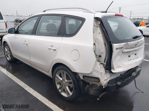 2012 Hyundai Elantra Touring SE with VIN KMHDC8AE2CU146880, listed as a IAAI auction lot 41705022 with 53,870 mi miles. Bid and sale history available at carsss.com. Image 3.