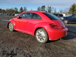 2012 Volkswagen Beetle 2.5L w/Sun/Sound/Nav PZEV with VIN 3VWJP7AT4CM664608, listed as a Copart auction lot 86560364 with 109,106 mi miles and Salvage Title. Bid and sale history available at carsss.com. Image 2.