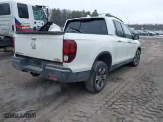 2019 Honda Ridgeline RTL-E with VIN 5FPYK3F77KB007879, listed as a IAAI auction lot 41697569 with 80,215 mi miles. Bid and sale history available at carsss.com. Image 4.