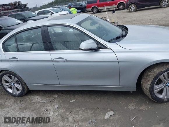 2017 BMW 3 Series 330i with VIN WBA8B9G38HNU56566, listed as a IAAI auction lot 41961845 with 63,353 mi miles. Bid and sale history available at carsss.com. Image 14.