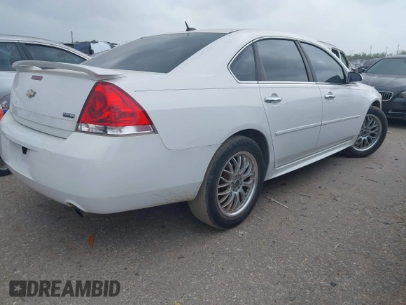 2012 Chevrolet Impala LTZ with VIN 2G1WC5E39C1224497, listed as a IAAI auction lot 41947943 with 210,726 mi miles and . Bid and sale history available at DreamBid. Image 4.