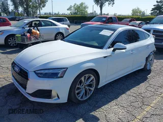 2023 Audi A5 Sportback Premium z VIN WAUABCF56PA039597, wystawiony jako IAAI lot #41979540 z przebiegiem 32 654 mil mil oraz . Historia ofert i sprzedaży dostępna na DreamBid. Obrazek 2.