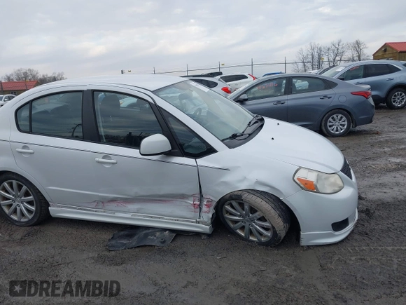 2010 Suzuki SX4 with VIN JS2YC5A43A6300225, listed as a IAAI auction lot 41654094 with 60,098 mi miles and . Bid and sale history available at DreamBid. Image 6.