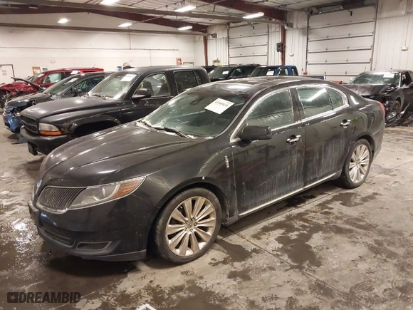 2013 Lincoln MKS EcoBoost with VIN 1LNHL9FT1DG614189, listed as a IAAI auction lot 41549635 with 180043 miles. Bid and sale history available at carsss.com. Image 2.