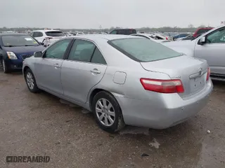 2007 Toyota Camry CE with VIN 4T1BE46K57U075558, listed as a IAAI auction lot 41948885 with 275,636 mi miles. Bid and sale history available at carsss.com. Image 3.