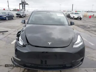 2022 Tesla Model Y Long Range z VIN 7SAYGDEE0NF508958, wystawiony jako IAAI lot #42191819 z przebiegiem 60 880 mil mil oraz . Historia ofert i sprzedaży dostępna na DreamBid. Obrazek 12.