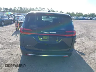 2023 Chrysler Pacifica Touring L with VIN 2C4RC1BG1PR606566, listed as a IAAI auction lot 42615498 with 42,980 mi miles and . Bid and sale history available at DreamBid. Image 16.