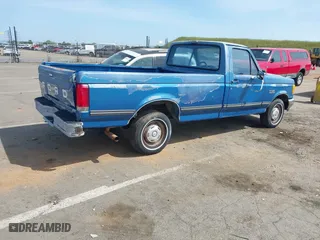 1990 Ford 1/2 Ton Trucks with VIN 1FTDF15N1LPA17475, listed as a IAAI auction lot 42045890 with 5,891 mi miles. Bid and sale history available at carsss.com. Image 4.