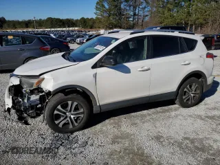2016 Toyota RAV4 LE with VIN JTMZFREV2GJ077312, listed as a Copart auction lot 88358125 with 126,428 mi miles and Salvage Title. Bid and sale history available at carsss.com. Image 1.