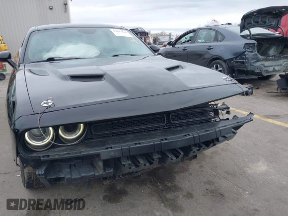 2015 Dodge Challenger R/T with VIN 2C3CDZATXFH712765, listed as a IAAI auction lot 41817210 with 99,535 mi miles and . Bid and sale history available at DreamBid. Image 13.