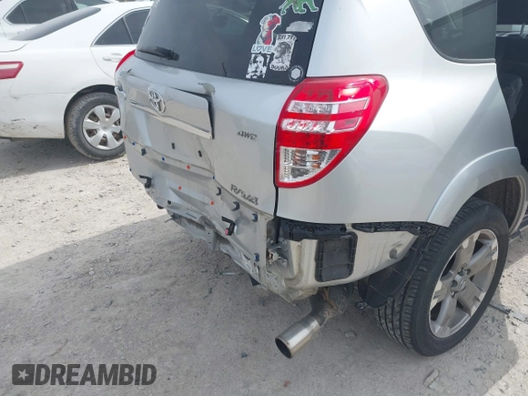 2012 Toyota RAV4 Sport with VIN JTMRF4DV2C5057309, listed as a IAAI auction lot 41809274 with 87,392 mi miles. Bid and sale history available at carsss.com. Image 18.