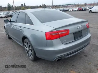 2013 Audi A6 Prestige z VIN WAUHGAFC2DN009441, wystawiony jako IAAI lot #41848400 z przebiegiem 147 198 mil mil oraz . Historia ofert i sprzedaży dostępna na DreamBid. Obrazek 3.