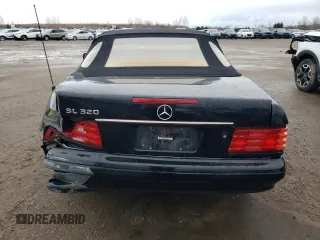 1997 Mercedes-Benz SL-Class with VIN WDBFA63F5VF145337, listed as a Copart auction lot 79991204 with 134,424 mi miles and Salvage Title. Bid and sale history available at carsss.com. Image 6.