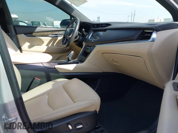 2017 Cadillac XT5 FWD with VIN 1GYKNARS7HZ144148, listed as a IAAI auction lot 41392399 with 96,252 mi miles and . Bid and sale history available at carsss.com. Image 5.