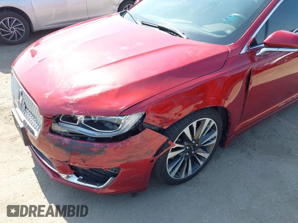 2019 Lincoln MKZ Hybrid Reserve II with VIN 3LN6L5MU7KR617325, listed as a IAAI auction lot 42584481 with 76,118 mi miles and . Bid and sale history available at DreamBid. Image 6.