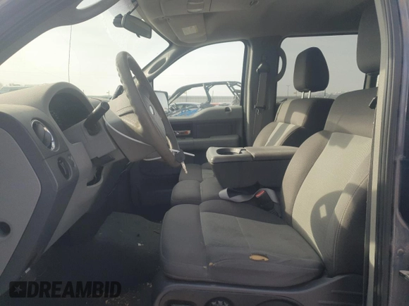 2005 Ford F-150 XLT with VIN 1FTPW14565FB11522, listed as a Copart auction lot 52006335 with 149,694 mi miles and Clean title. Bid and sale history available at DreamBid. Image 7.