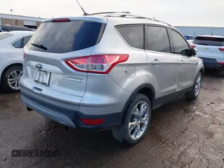 2013 Ford Escape Titanium with VIN 1FMCU0J90DUC13877, listed as a IAAI auction lot 42370172 with 119,745 mi miles and . Bid and sale history available at DreamBid. Image 4.