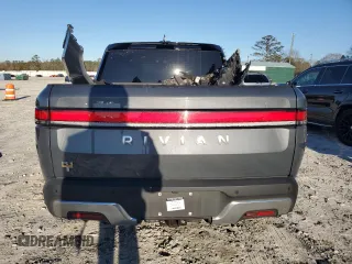 2023 Rivian R1T Adventure z VIN 7FCTGAAA1PN022134, wystawiony jako Copart lot #85545774 z przebiegiem 48 951 mil mil oraz Szkoda całkowita • Salvage title. Historia ofert i sprzedaży dostępna na DreamBid. Obrazek 6.