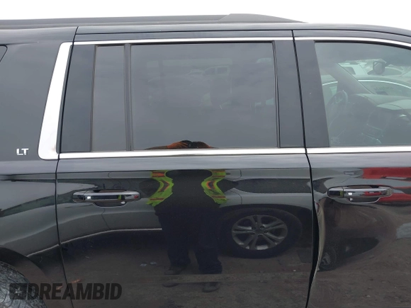 2015 Chevrolet Suburban LT with VIN 1GNSCJKC1FR304656, listed as a IAAI auction lot 42071124 with 133,140 mi miles. Bid and sale history available at carsss.com. Image 13.