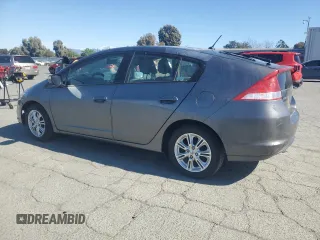 2011 Honda Insight EX z VIN JHMZE2H71BS006434, wystawiony jako Copart lot #58045495 z przebiegiem 270 645 mil mil oraz Czysty tytuł • Clean title. Historia ofert i sprzedaży dostępna na DreamBid. Obrazek 2.