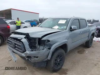 2021 Toyota Tacoma 4WD SR with VIN 5TFCZ5AN3MX260853, listed as a IAAI auction lot 41784451 with 122,244 mi miles. Bid and sale history available at carsss.com. Image 2.