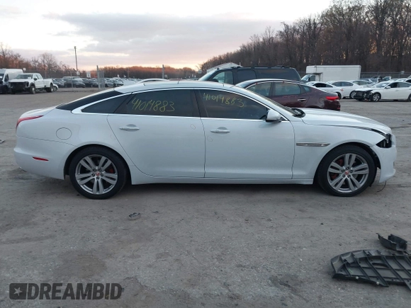 2017 Jaguar XJ with VIN SAJWJ2GD5H8W08395, listed as a IAAI auction lot 41014883 with 80,584 mi miles. Bid and sale history available at carsss.com. Image 13.