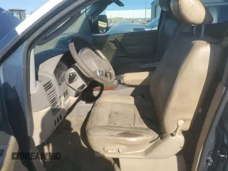 2011 Nissan Titan Pro-4X with VIN 1N6BA0ECXBN302004, listed as a Copart auction lot 89343945 with 427,682 mi miles and Salvage title. Bid and sale history available at DreamBid. Image 7.