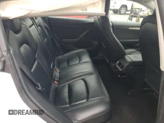 2023 Tesla Model 3 z VIN 5YJ3E1EA1PF561521, wystawiony jako Copart lot #55637855 z przebiegiem 83 008 mil mil oraz Szkoda całkowita • Salvage title. Historia ofert i sprzedaży dostępna na DreamBid. Obrazek 10.