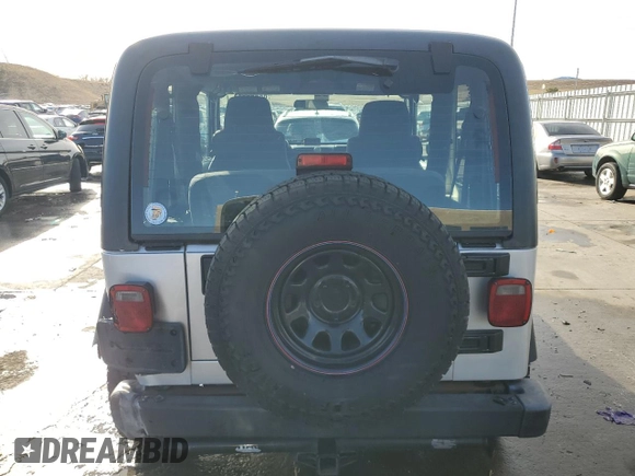 2006 Jeep Wrangler SE with VIN 1J4FA29S76P781617, listed as a Copart auction lot 85903084 with Not Provided miles and Salvage Title. Bid and sale history available at carsss.com. Image 6.