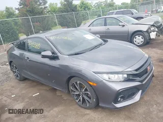 2019 Honda Civic Si z VIN 2HGFC3A53KH752062, wystawiony jako IAAI lot #42422815 z przebiegiem 67 157 mil mil oraz . Historia ofert i sprzedaży dostępna na DreamBid. Obrazek 1.