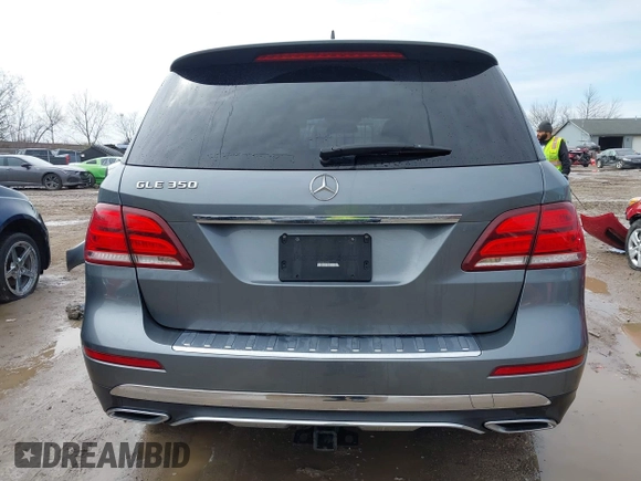 2018 Mercedes-Benz GLE 350 z VIN 4JGDA5JB0JB147786, wystawiony jako IAAI lot #42005953 z przebiegiem 138 905 mil mil oraz . Historia ofert i sprzedaży dostępna na DreamBid. Obrazek 17.