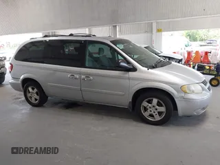 2005 Dodge Caravan SXT with VIN 2D4GP44L65R335656, listed as a IAAI auction lot 42526728 with 322,176 mi miles and . Bid and sale history available at DreamBid. Image 13.