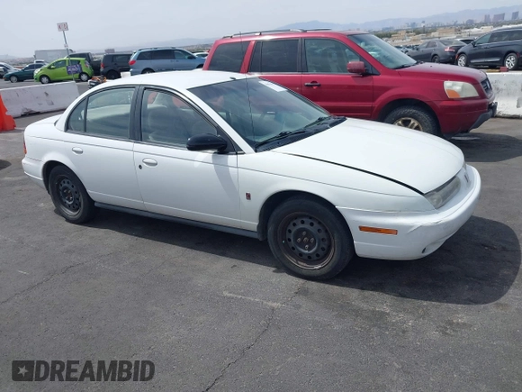 1998 Saturn SL z VIN 1G8ZJ5272WZ312413, wystawiony jako IAAI lot #41874493 z przebiegiem 229 200 mil mil oraz . Historia ofert i sprzedaży dostępna na DreamBid. Obrazek 1.