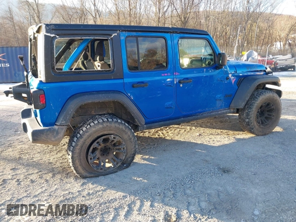2021 Jeep Wrangler Unlimited Sport S with VIN 1C4HJXDN4MW779291, listed as a IAAI auction lot 41290109 with 43,379 mi miles and . Bid and sale history available at DreamBid. Image 4.