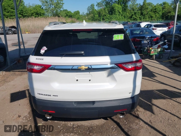 2018 Chevrolet Traverse LT Cloth z VIN 1GNEVGKWXJJ270664, wystawiony jako IAAI lot #42176492 z przebiegiem 73 534 mil mil oraz . Historia ofert i sprzedaży dostępna na DreamBid. Obrazek 17.