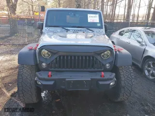 2015 Jeep Wrangler Unlimited Rubicon Hard Rock with VIN 1C4HJWFG1FL777222, listed as a IAAI auction lot 41843893 with 74,718 mi miles. Bid and sale history available at carsss.com. Image 12.