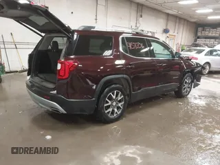 2021 GMC Acadia SLE with VIN 1GKKNRLS9MZ113401, listed as a IAAI auction lot 41571206 with 64,978 mi miles. Bid and sale history available at carsss.com. Image 4.