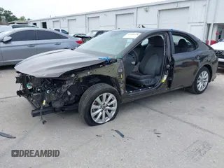 2019 Toyota Camry LE with VIN 4T1B11HKXKU818442, listed as a IAAI auction lot 41906128 with 30,728 mi miles and . Bid and sale history available at DreamBid. Image 18.