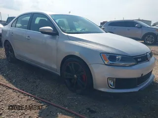2013 Volkswagen Jetta with VIN 3VW467AJ4DM211542, listed as a IAAI auction lot 42678841 with 153,335 mi miles and . Bid and sale history available at DreamBid. Image 1.