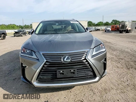 2019 Lexus RX 350 z VIN 2T2ZZMCA9KC129707, wystawiony jako Copart lot #52202615 z przebiegiem 69 868 mil mil oraz Szkoda całkowita • Salvage title. Historia ofert i sprzedaży dostępna na DreamBid. Obrazek 11.