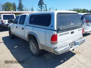 2000 Dodge Dakota Sport with VIN 1B7GG2AN9YS792231, listed as a IAAI auction lot 42174764 with 285,535 mi miles and . Bid and sale history available at carsss.com. Image 3.