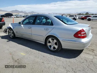 2003 Mercedes-Benz E-Class 5.0L with VIN WDBUF70J63A189963, listed as a Copart auction lot 50898675 with 130,264 mi miles and Salvage Title. Bid and sale history available at carsss.com. Image 2.