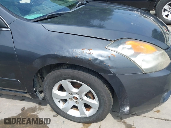 2009 Nissan Altima 2.5 z VIN 1N4AL21E69N560192, wystawiony jako IAAI lot #42030783 z przebiegiem 179 859 mil mil oraz . Historia ofert i sprzedaży dostępna na DreamBid. Obrazek 17.